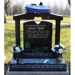 Staxton type memorial with granite fishing boat